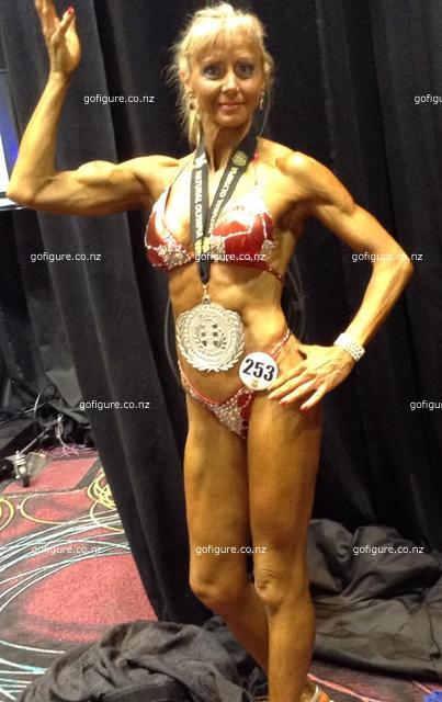 15-inba-olympia-judymedal.jpg